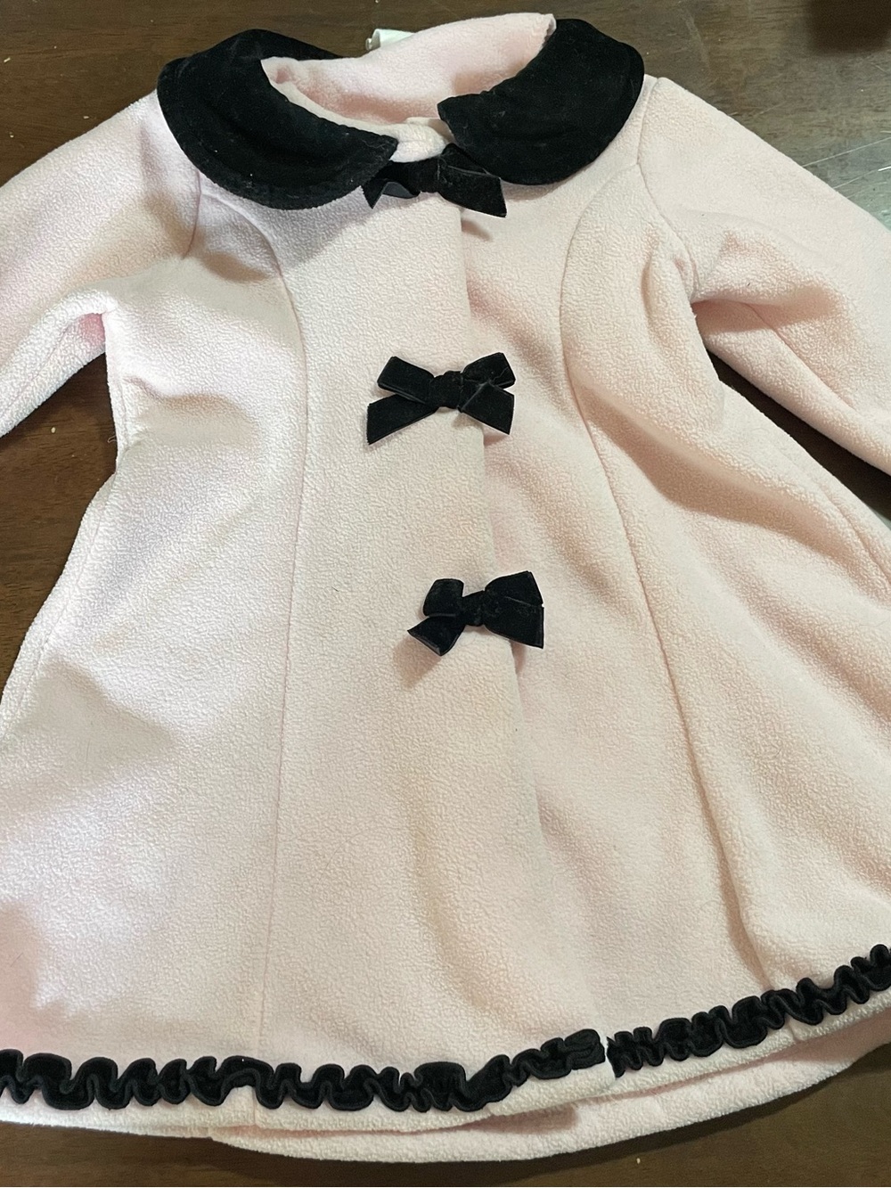 Starting Out Pink Coat with Black Velvet Collar & Bows